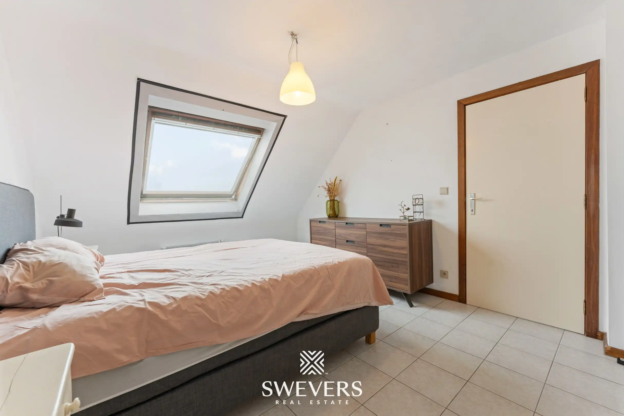 Instapklaar en lichtrijk 1-slaapkamerappartement op topligging in Houthalen centrum foto 16