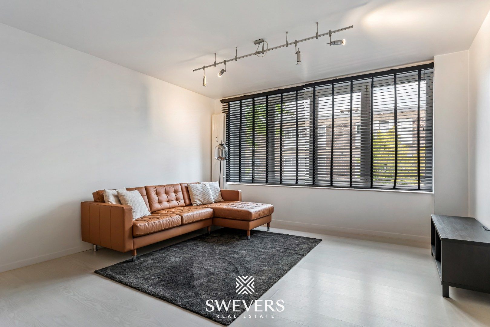 Instapklaar en energiezuinig 2-slaapkamerappartement in het centrum van Heppen foto 6