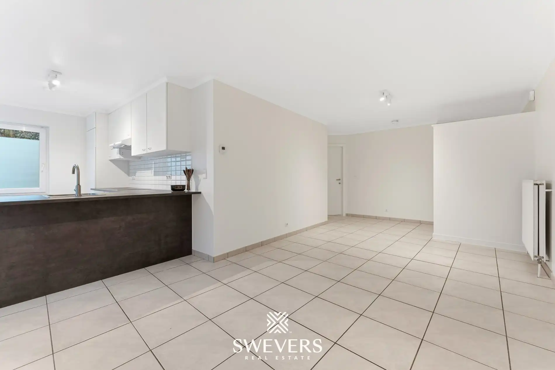 Ontdek dit instapklaar, energiezuinig en verrassend ruim gelijkvloers appartement in het charmante Zichem foto 8