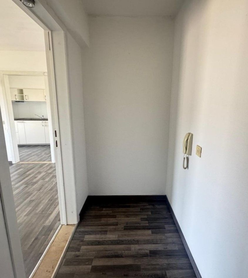 Intrekklaar appartement pal in het centrum van Genk foto 8