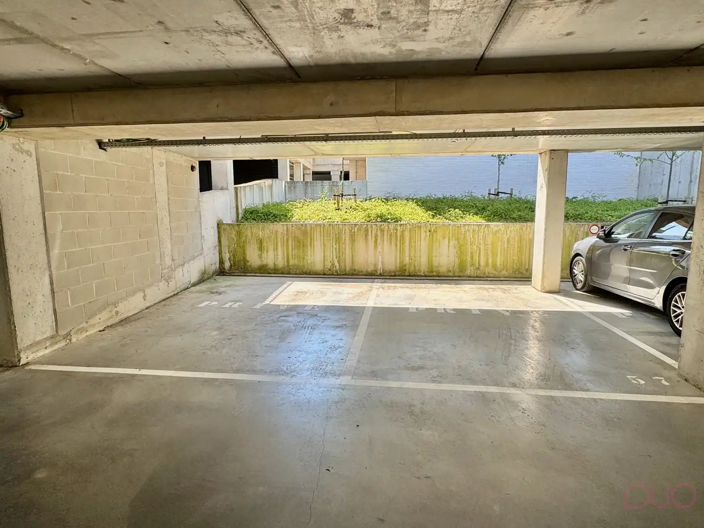 Ruime ondergrondse autostaanplaats met mogelijkheid tot laadpaal in residentie De Stadspoort. foto 4