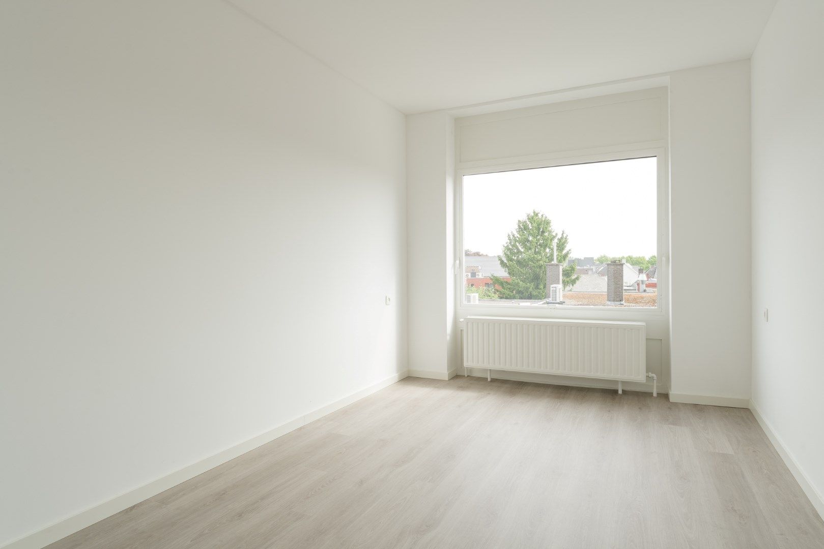 Volledig gerenoveerd 3 slaapkamer appartement in Neerpelt centrum. foto 13
