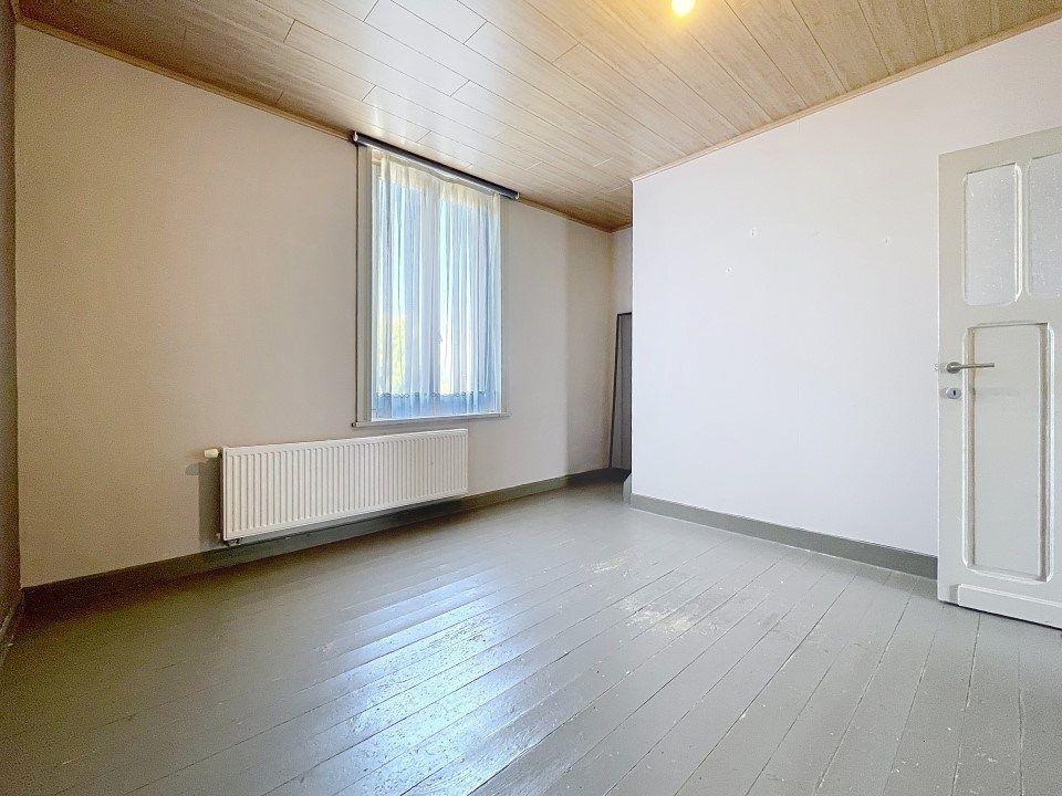 Ruime woning met grote tuin en terras in het centrum foto 11