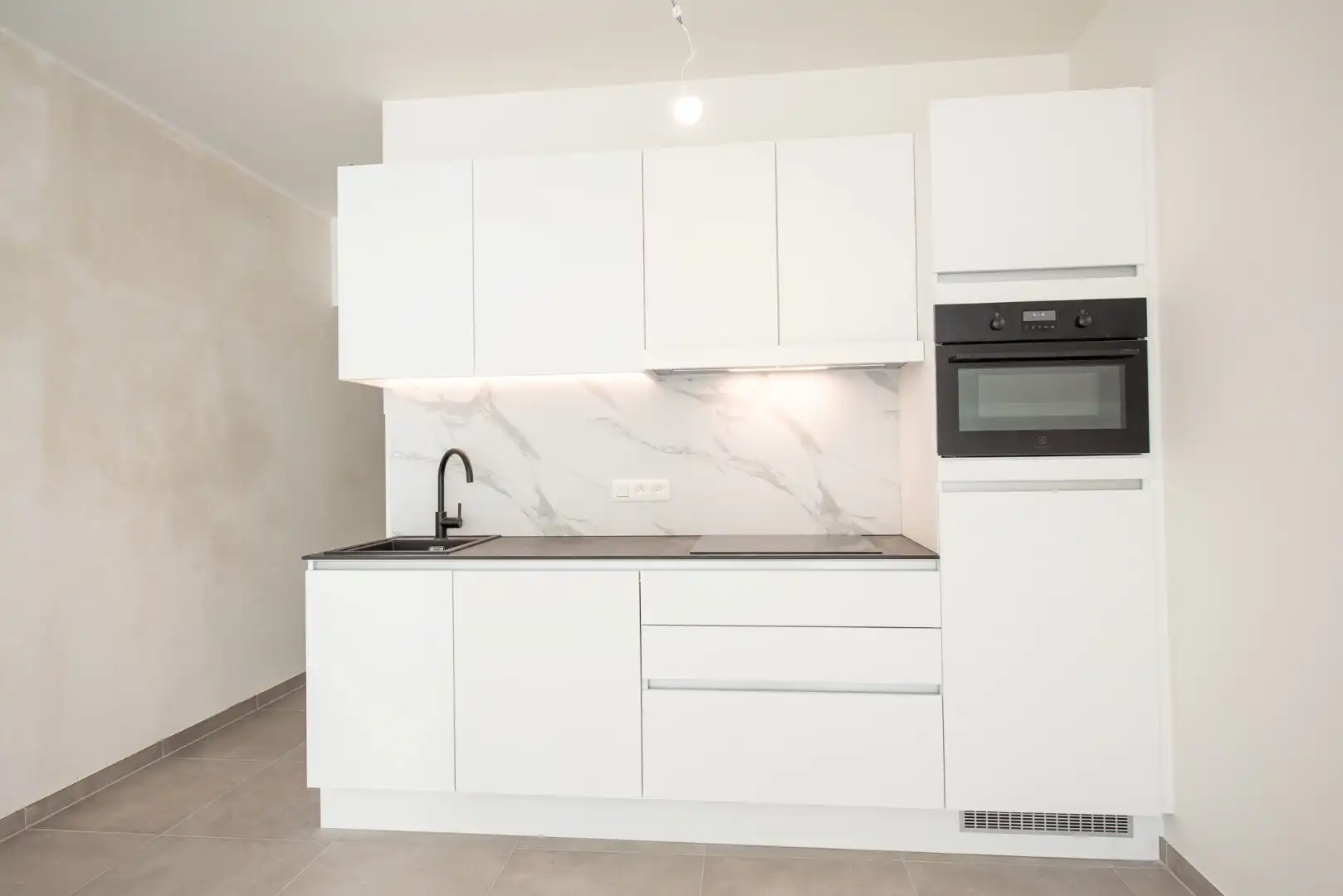 Instapklaar éénslaapkamerappartement met stadstuin foto 4