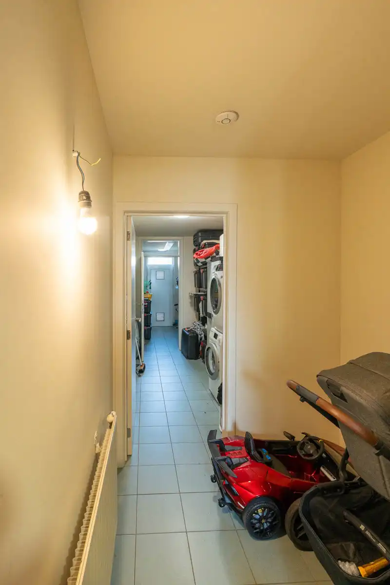 Ruim, energiezuinig appartement met terras, tuin en garage foto 25