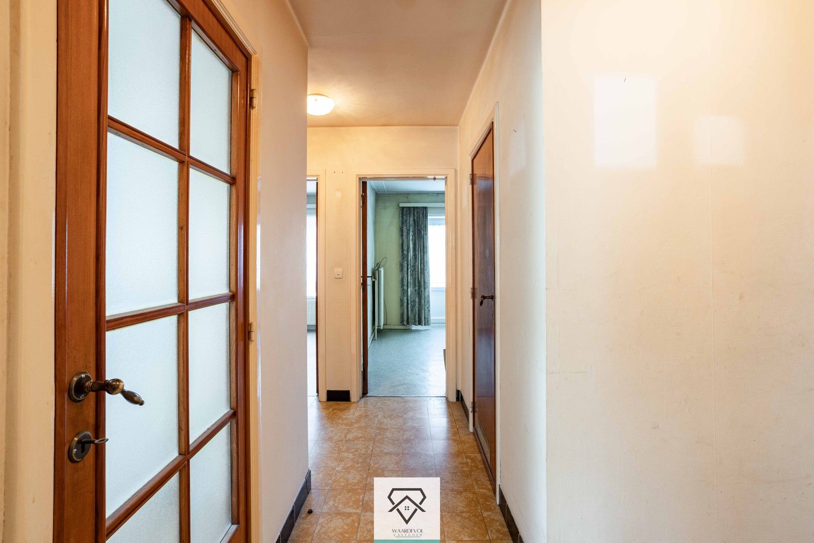 Opbrengsteigendom met 4 appartementen en 2 dubbele garageboxen te koop foto 9