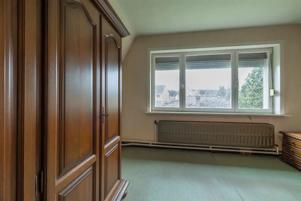 Vlakbij ingang merodebossen, soldie woning met potentieel foto 44
