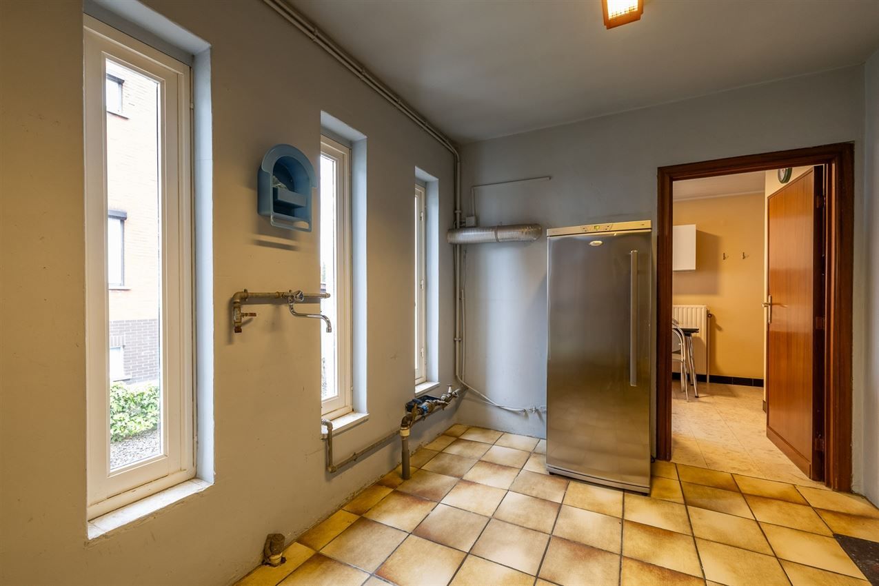 Te renoveren woning met 4 slk. in het hart van Averbode foto 12