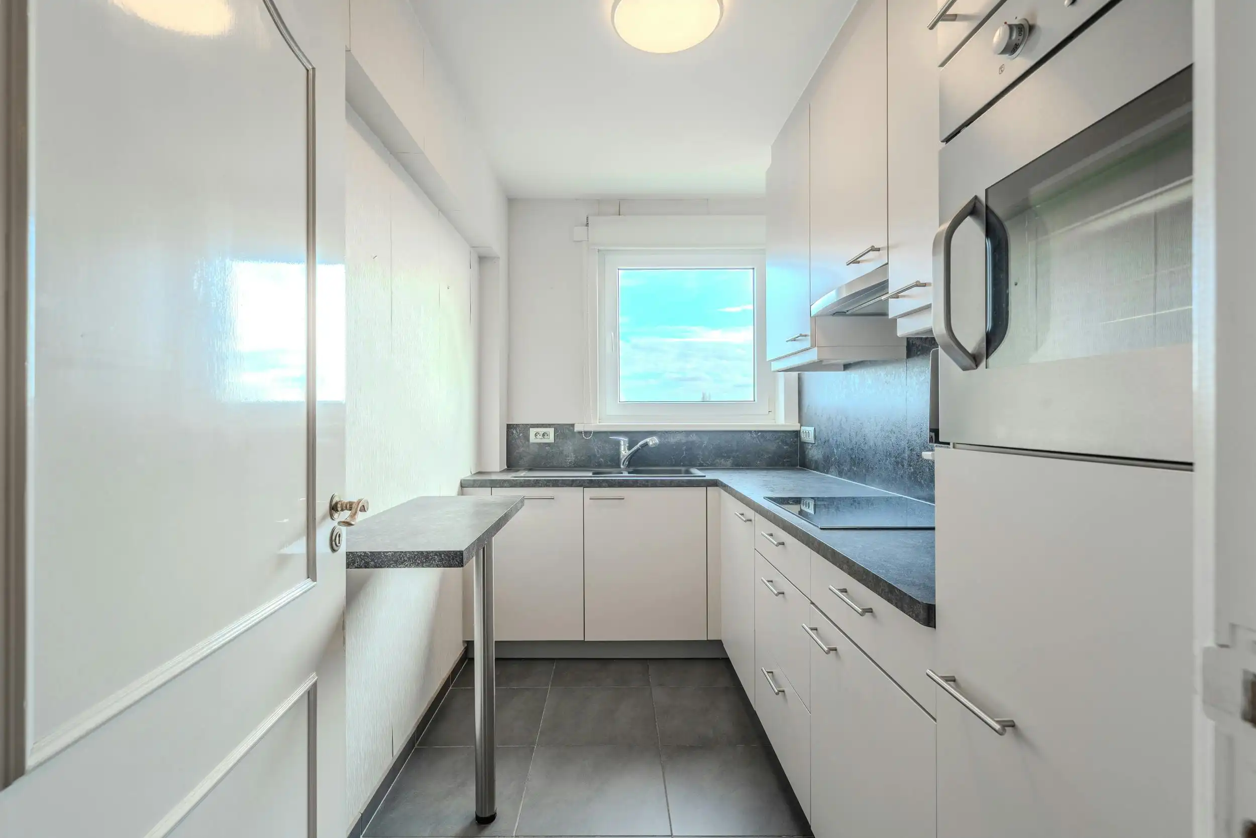 Zonnig hoekappartement met 2 slaapkamer en open uitzicht! foto 6