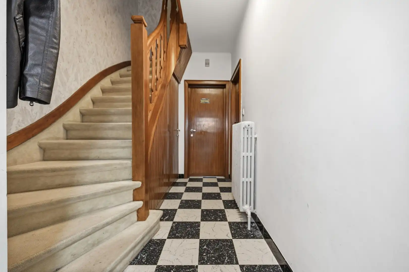 Instapklare rijwoning in een rustige straat te Tienen foto 5