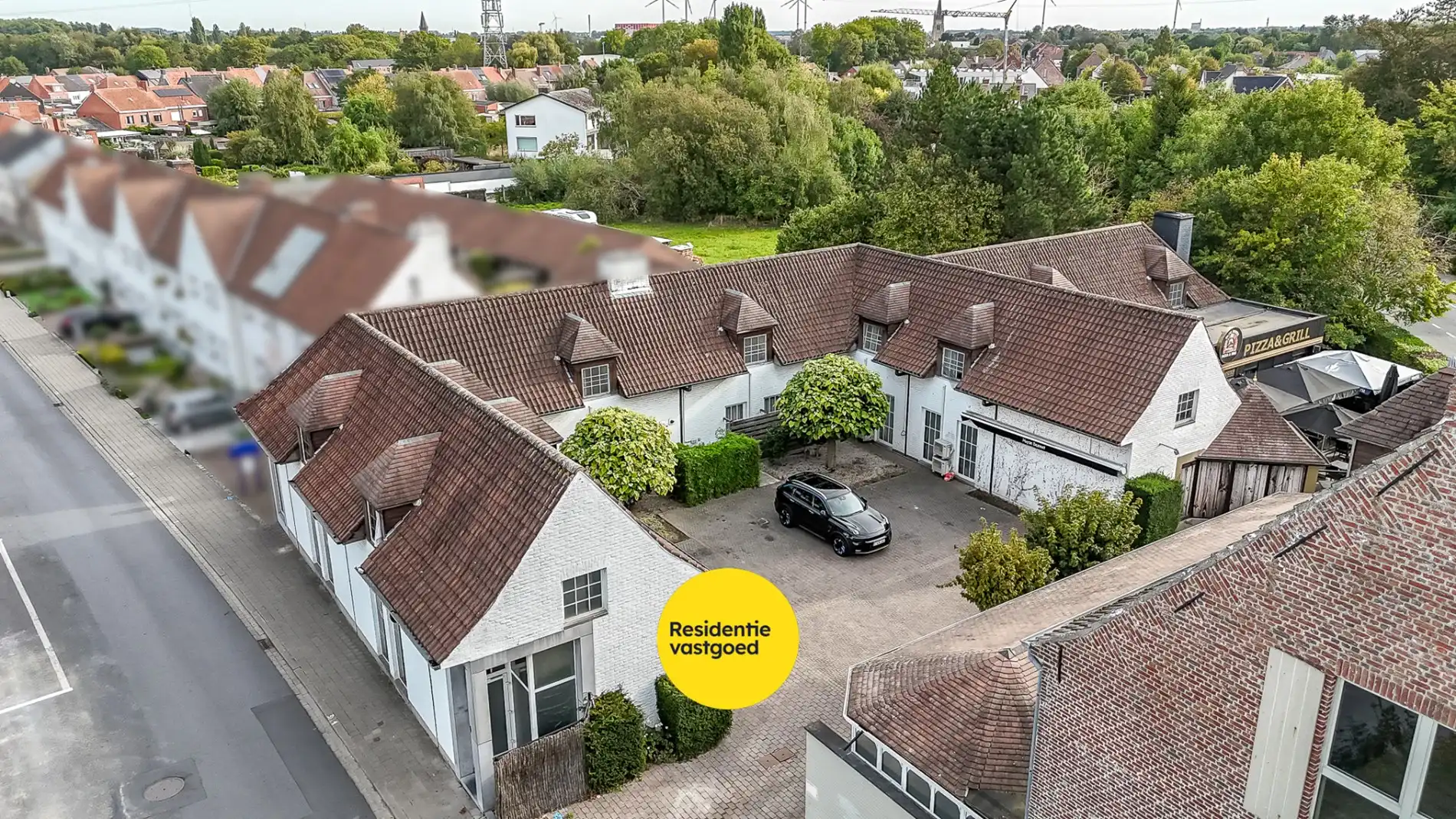 Multifunctionele eigendom met appartementen en handelszaken! foto 3