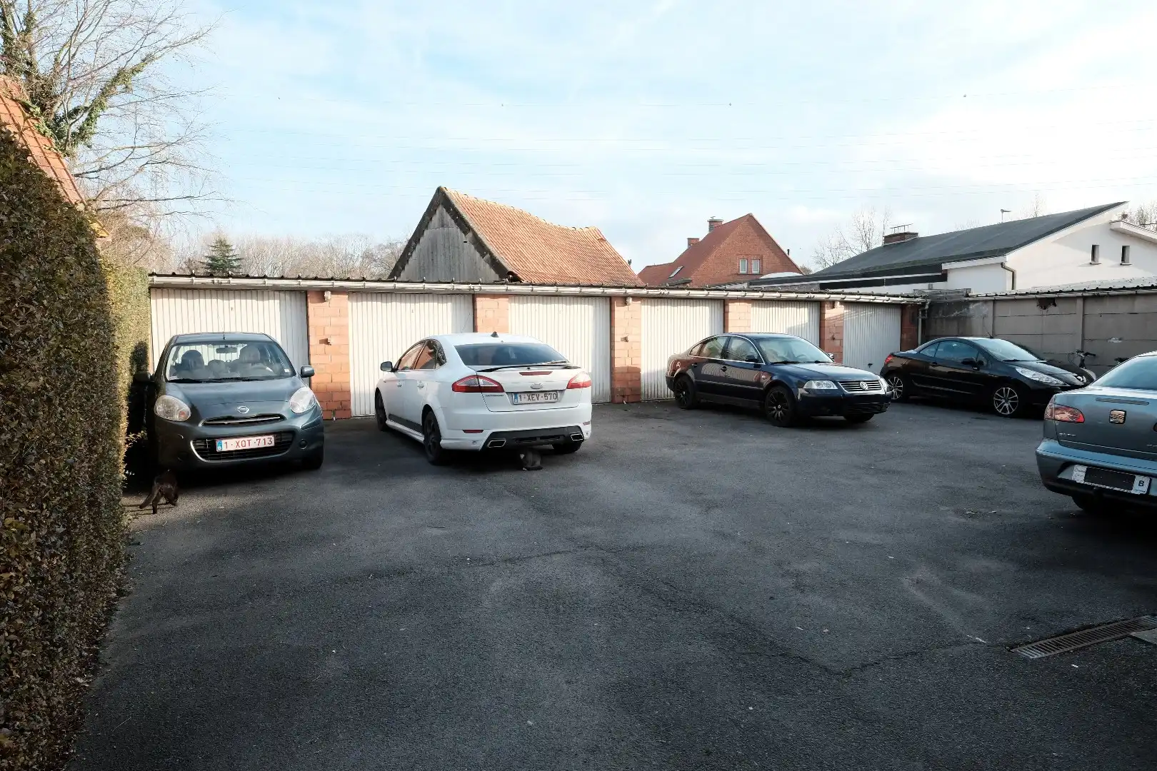 Opbrengsteigendom bestaande uit 5 appartementen en 6 garages foto 4