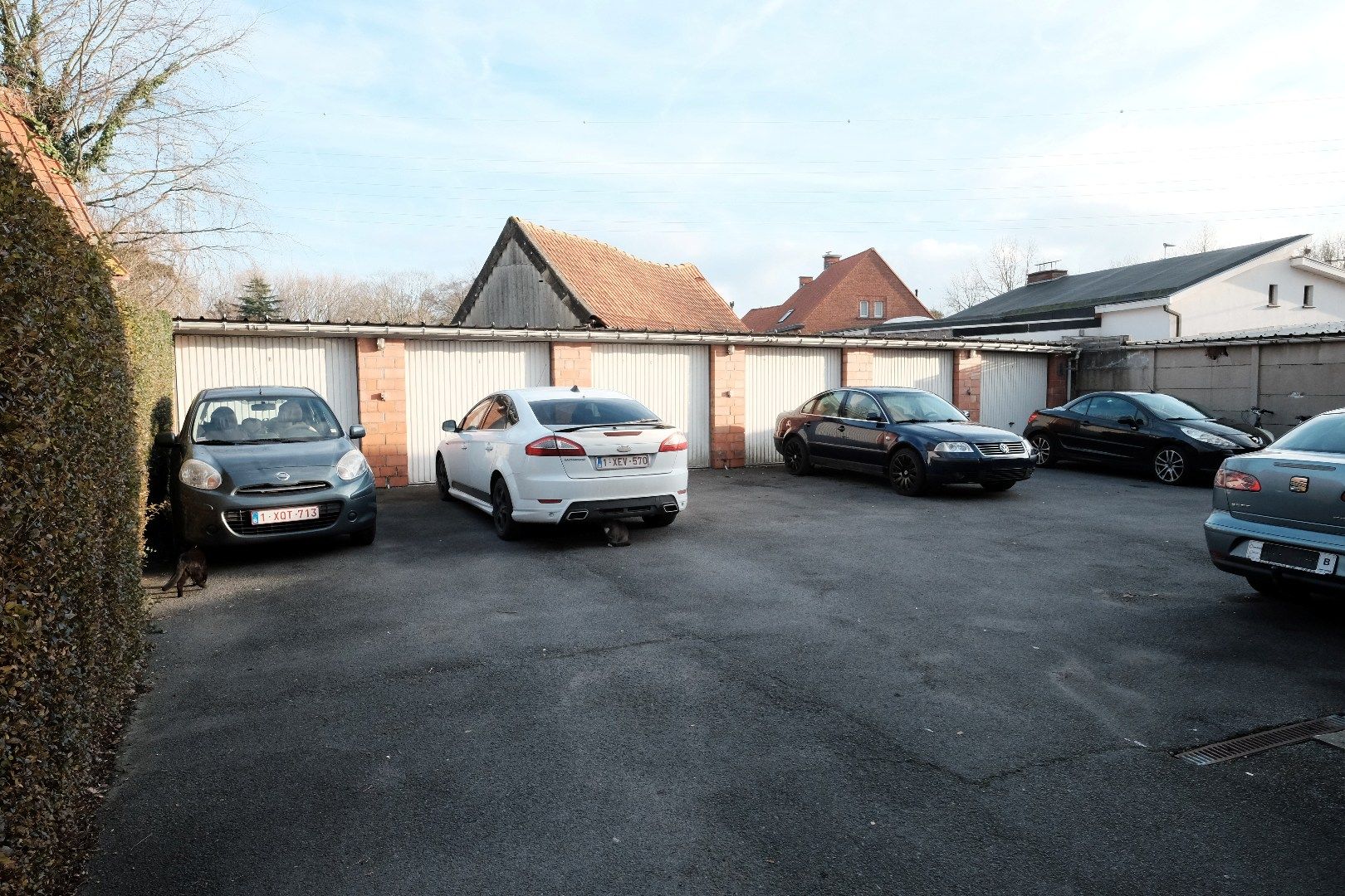Opbrengsteigendom bestaande uit 5 appartementen en 6 garages foto 4