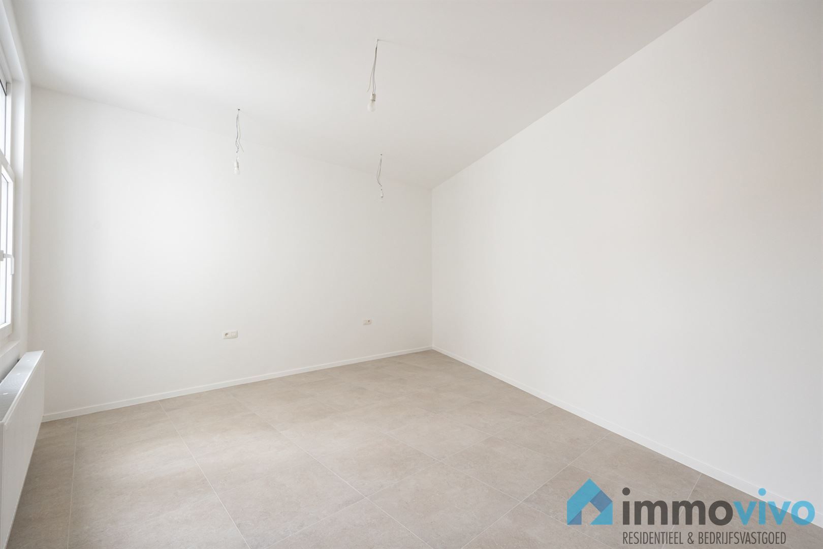 Volledig vernieuwd appartement met 3 slaapkamers, lift en kelder foto 9