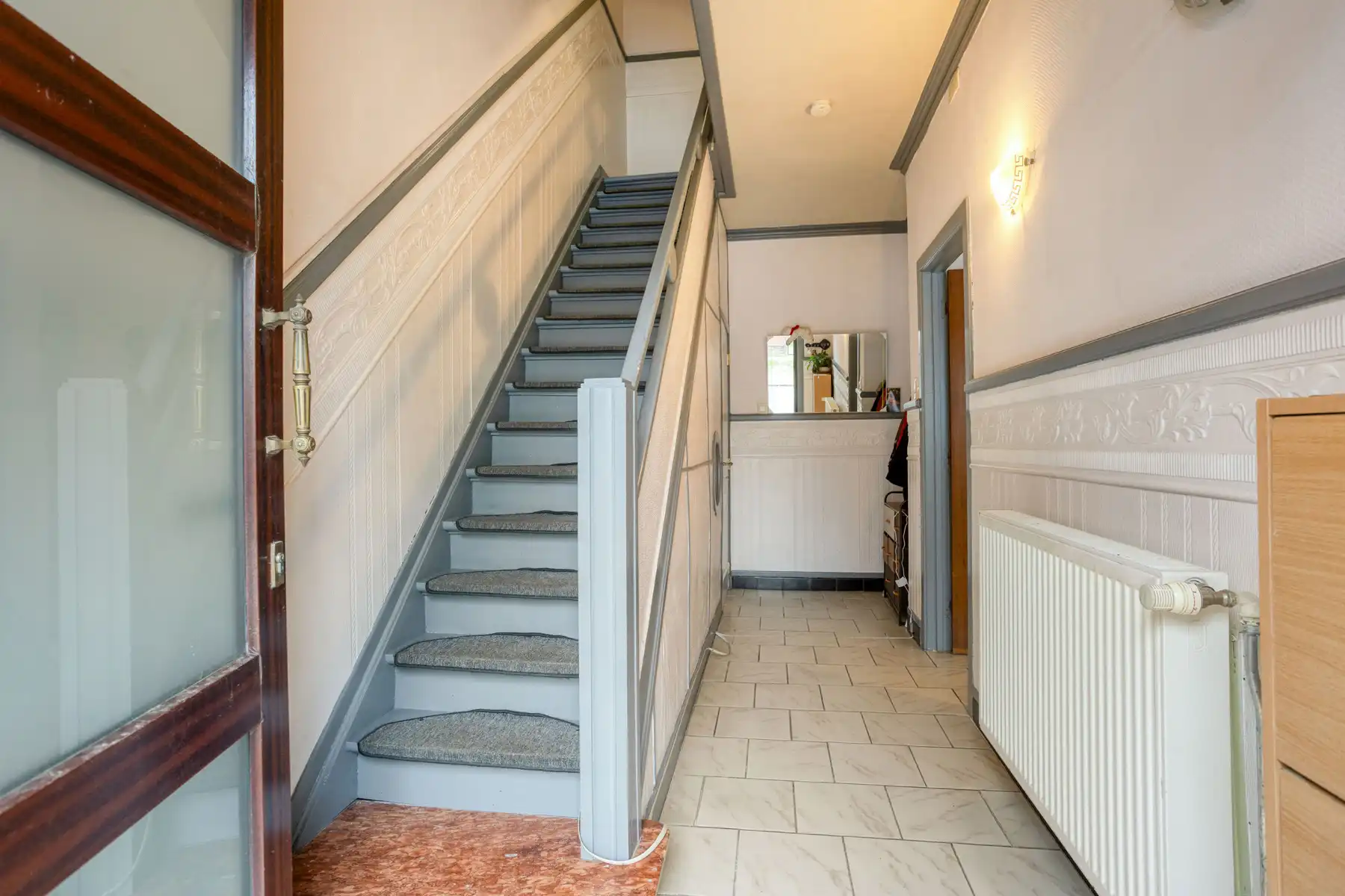 Te moderniseren woning met tuin en garage te Denderleeuw foto 2