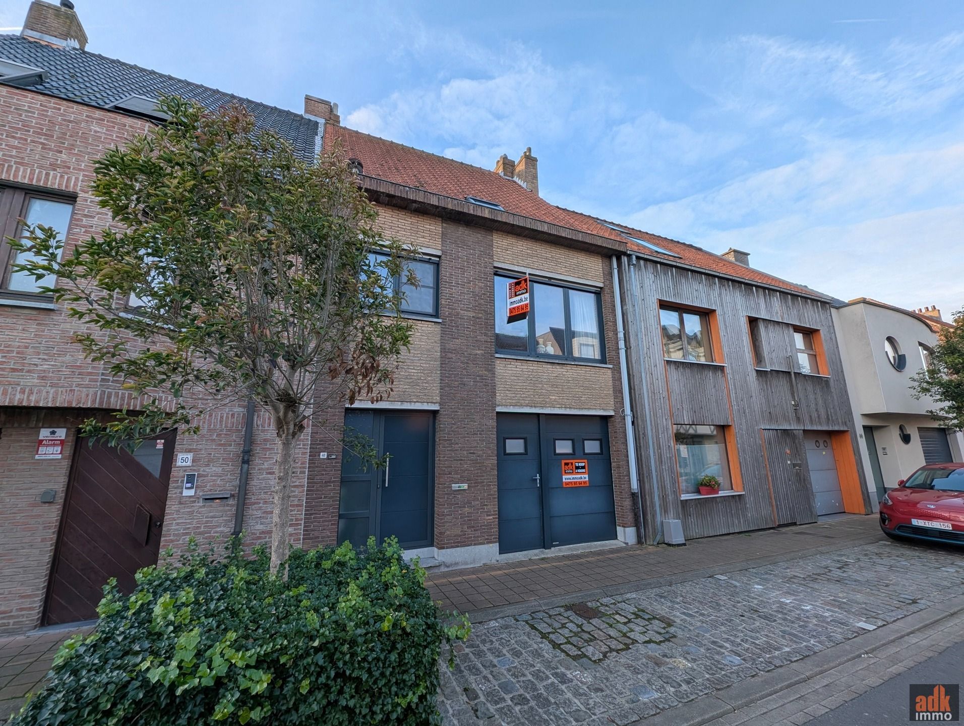 Ruime woning met zongerichte tuin te koop. Centrum De Panne aan zee. foto 2