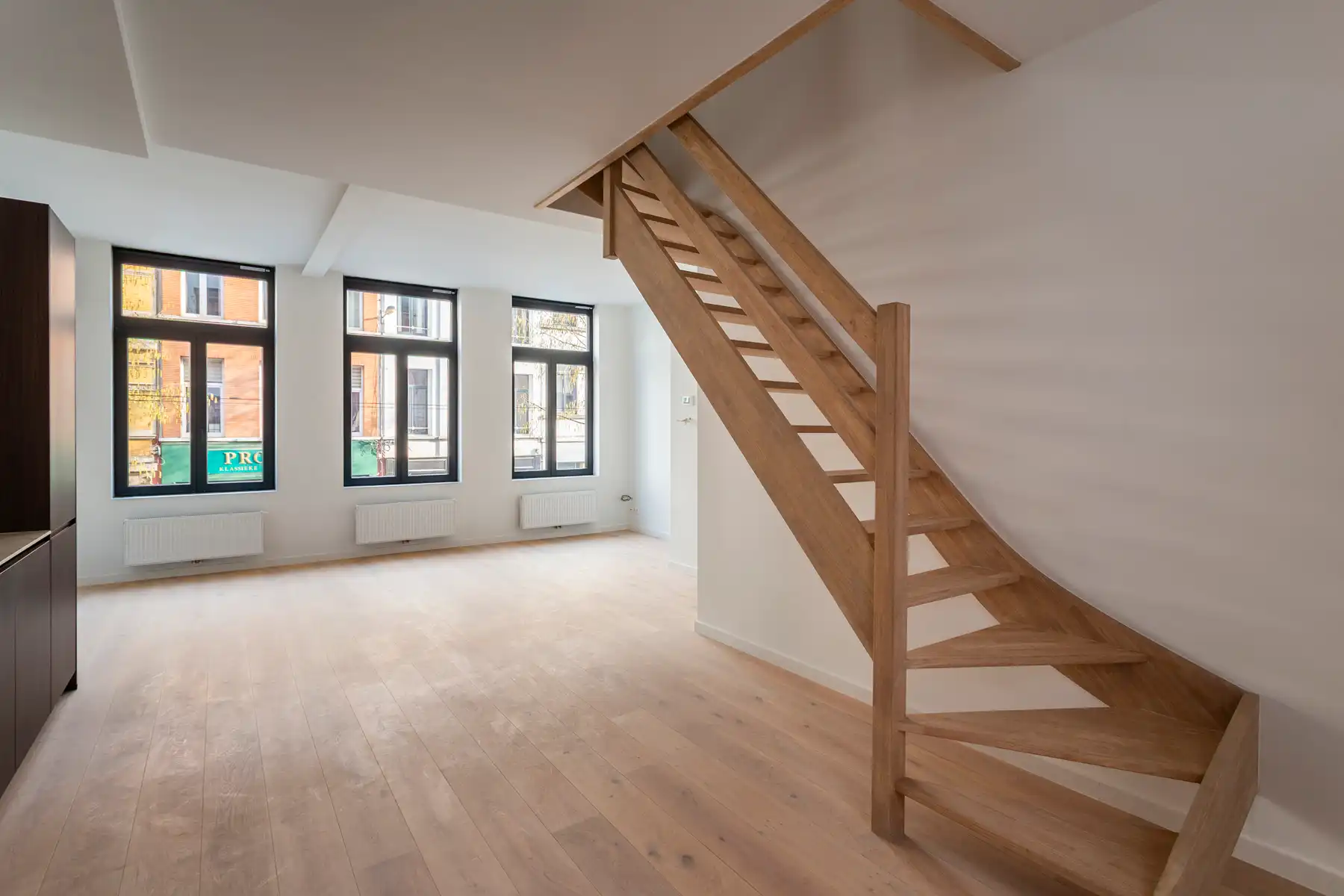 Gerenoveerde duplex met buitenruimte op het Zuid foto 3