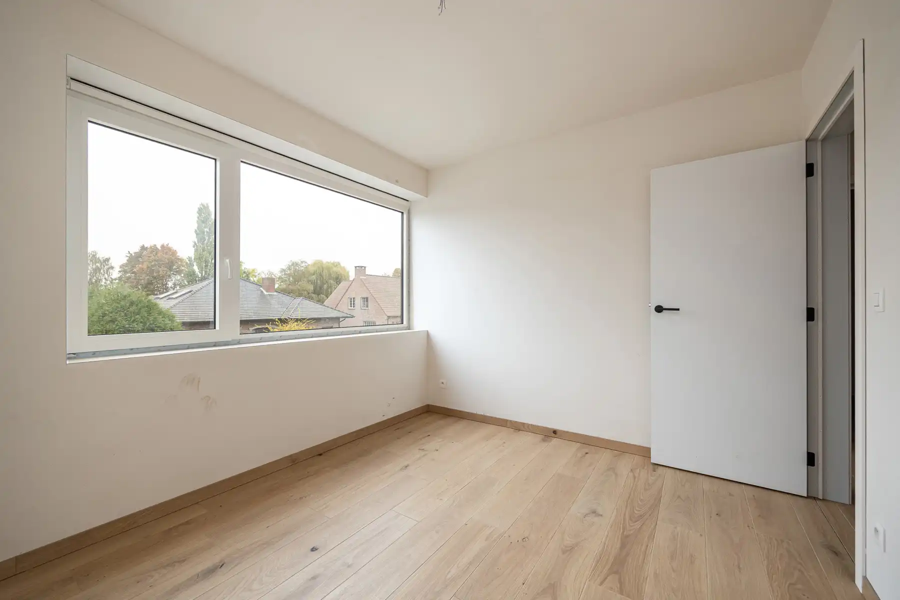 Halfopen woning met 3 slaapkamers en carport/fietsenberging op perceel van ca 320m² foto 16