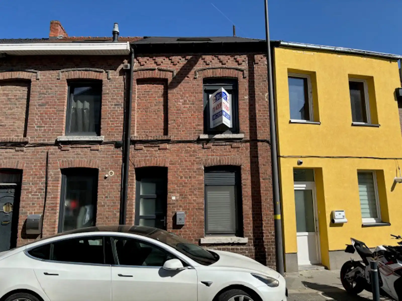 Woning met tuin en 3 slpks centrum Tienen foto {{pictureIndex}}