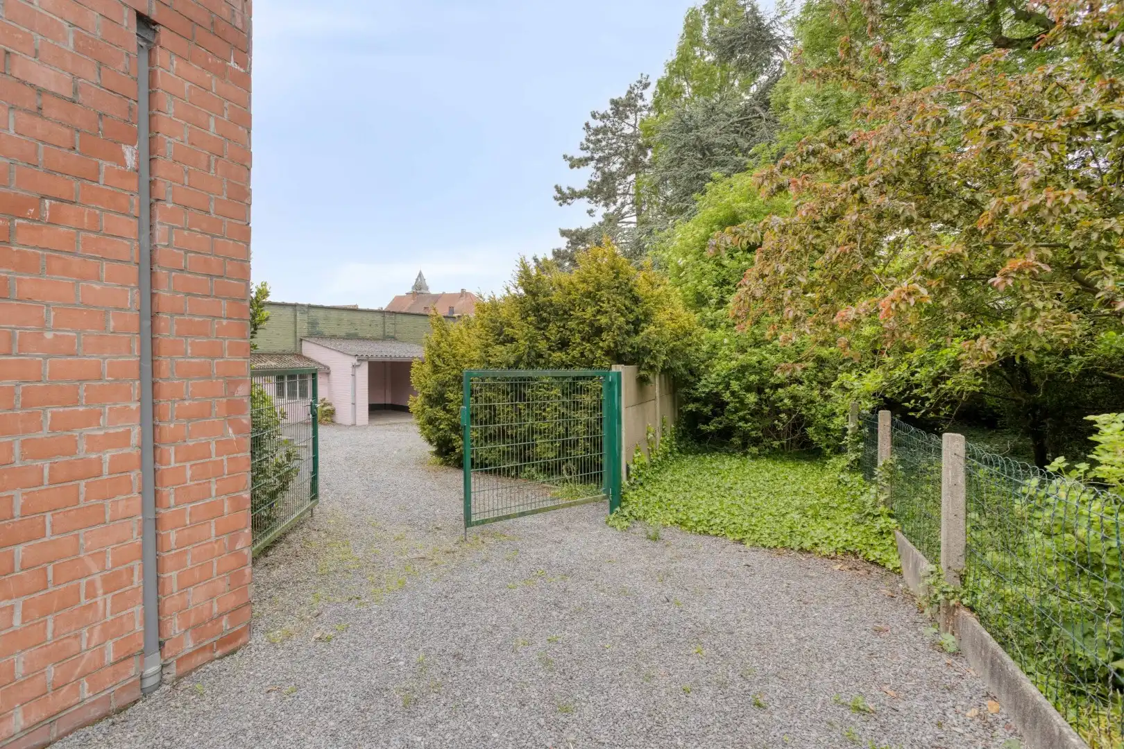 Te renoveren woning met tuin en garage in het centrum van Menen! foto 23