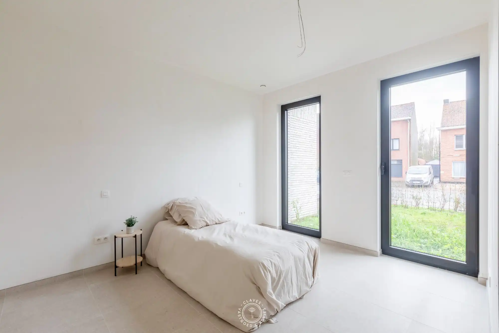 Grandioos gelijkvloers appartement met privatieve tuin foto 14