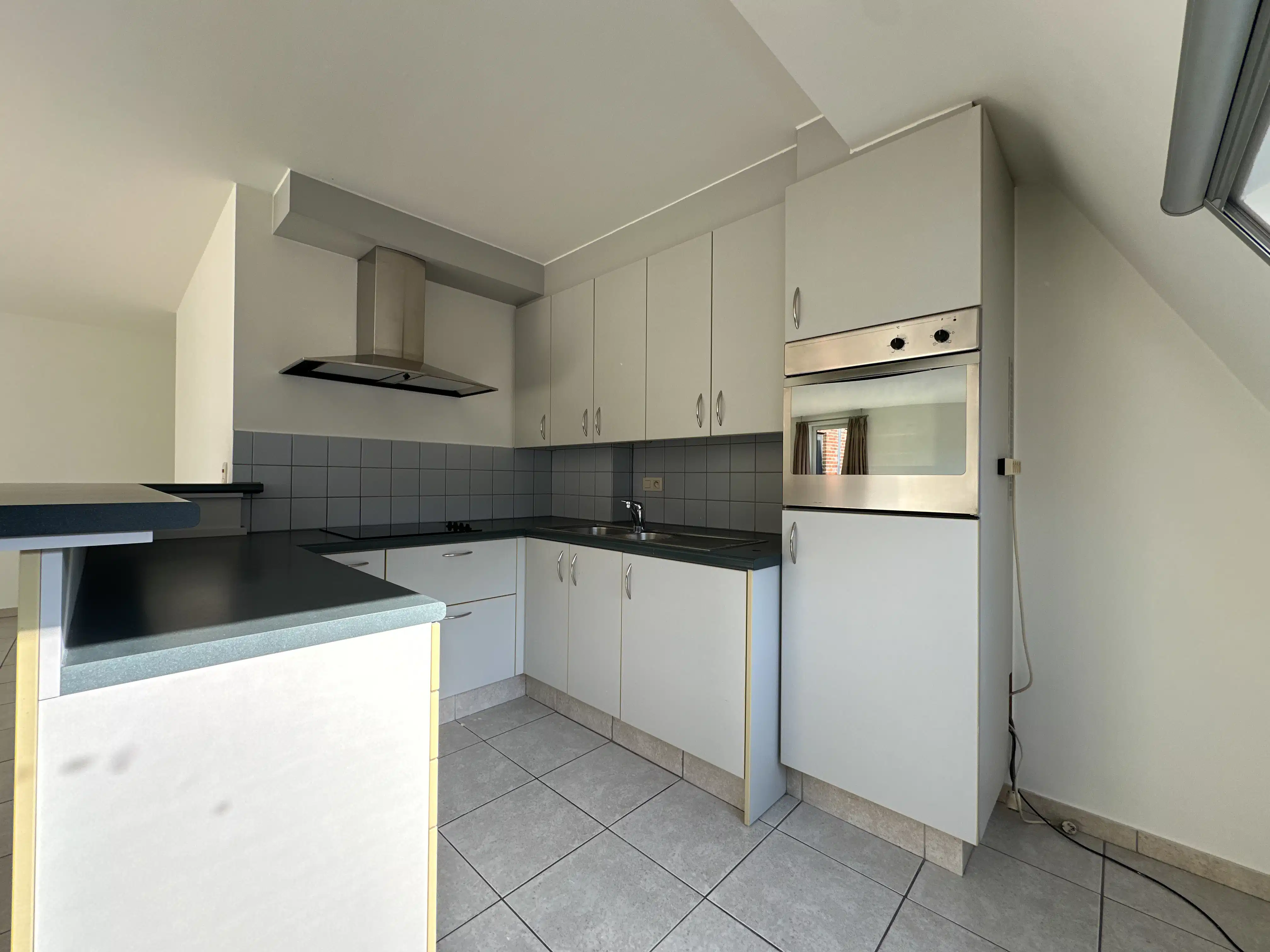 Ruim 2-slaapkamerappartement te huur in centrum Wetteren foto 2