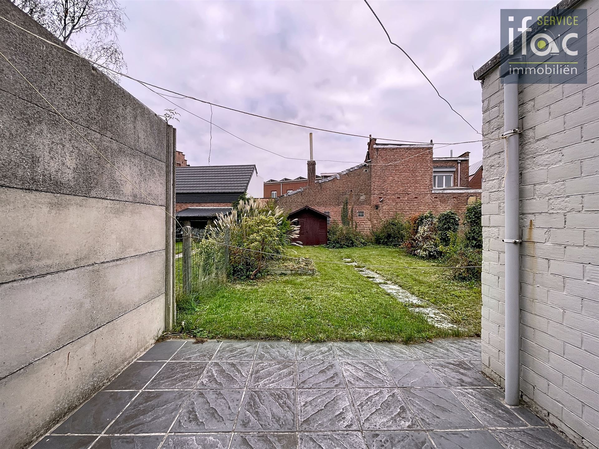 Rijwoning met tuin  foto 17