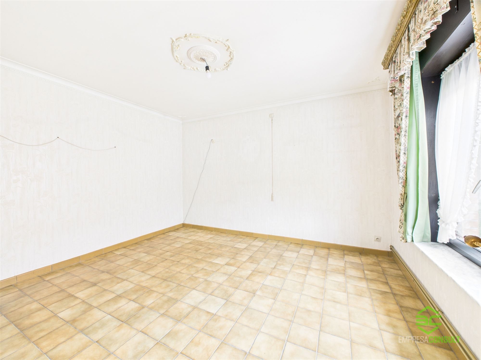 Gelijkvloerse woning in het centrum met 2 slpk en ruime tuinberging! foto 10