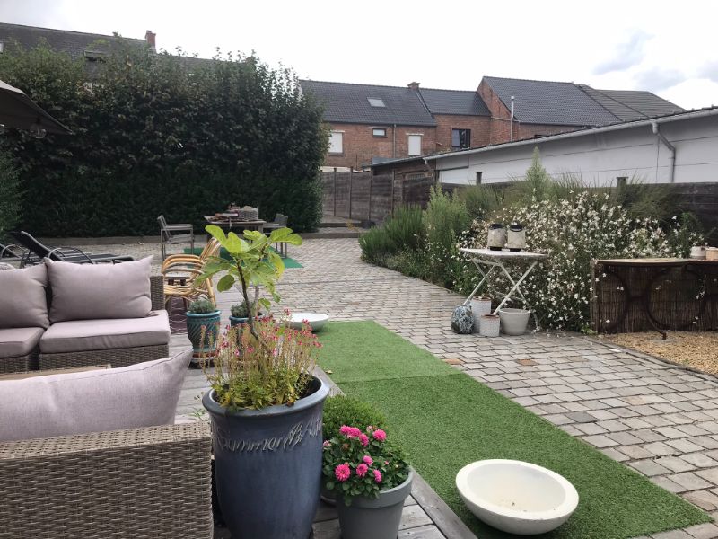 gezellige gezinswoning met ruim terras en zomer-tuinhuis foto {{pictureIndex}}