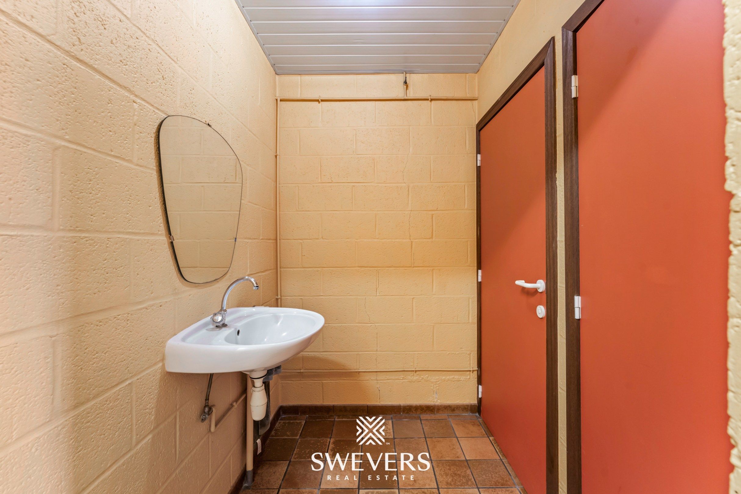 Instapklaar handelspand met woonst en tuin in Herk-de-Stad foto 8