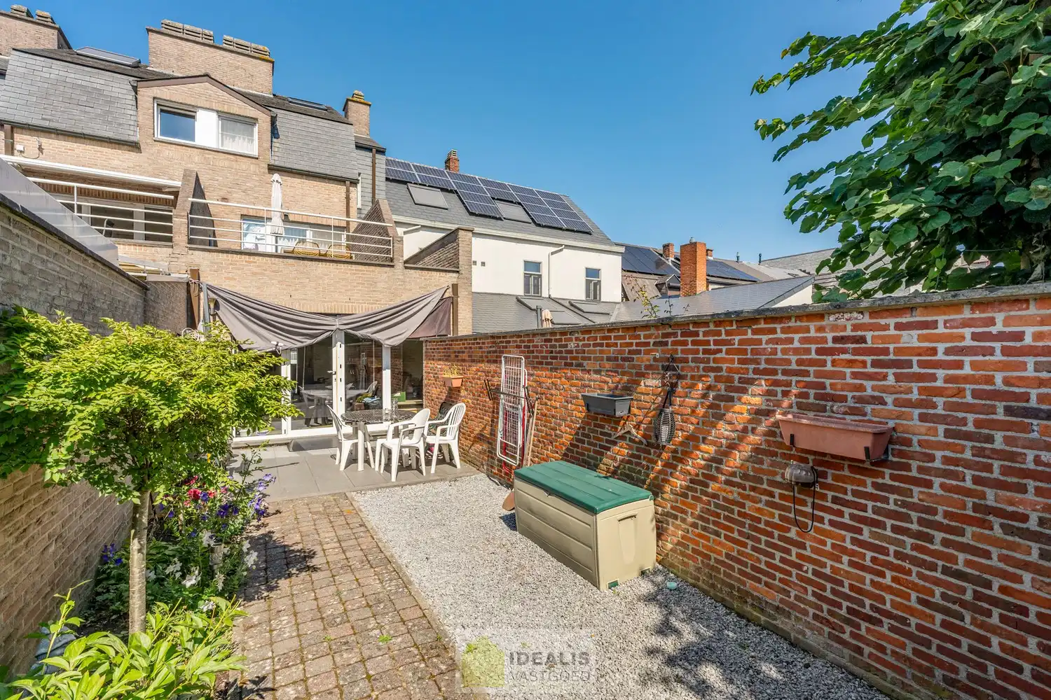 IDEALIS VASTGOED – GELIJKVLOERS APPARTEMENT MET LICHTRIJKE LEEFRUIMTE EN AANSLUITEND RUIME KEUKEN, BADKAMER, 2 SLAAPKAMERS EN GARAGEBOX OP EEN UITERST GUNSTIGE LOCATIE VLAK BIJ HET CENTRUM VAN PELT! foto 22
