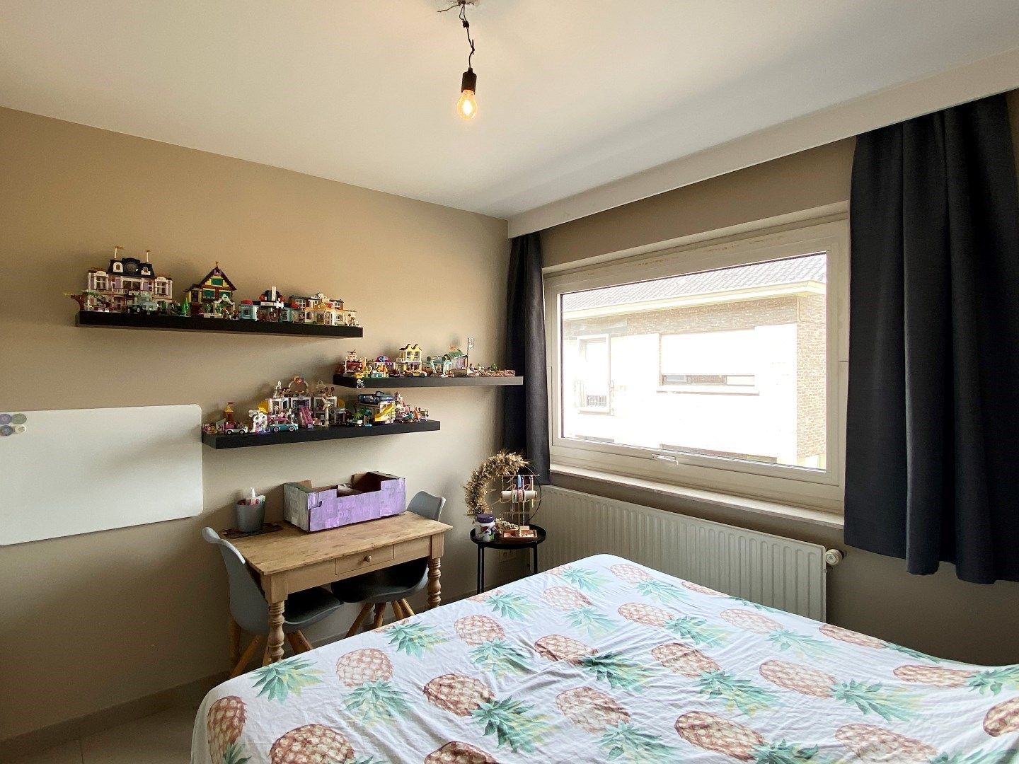 RUIM EN LICHTRIJK APPARTEMENT MET 3 SLAAPKAMERS EN GARAGE IN HARTJE PITTEM foto 9