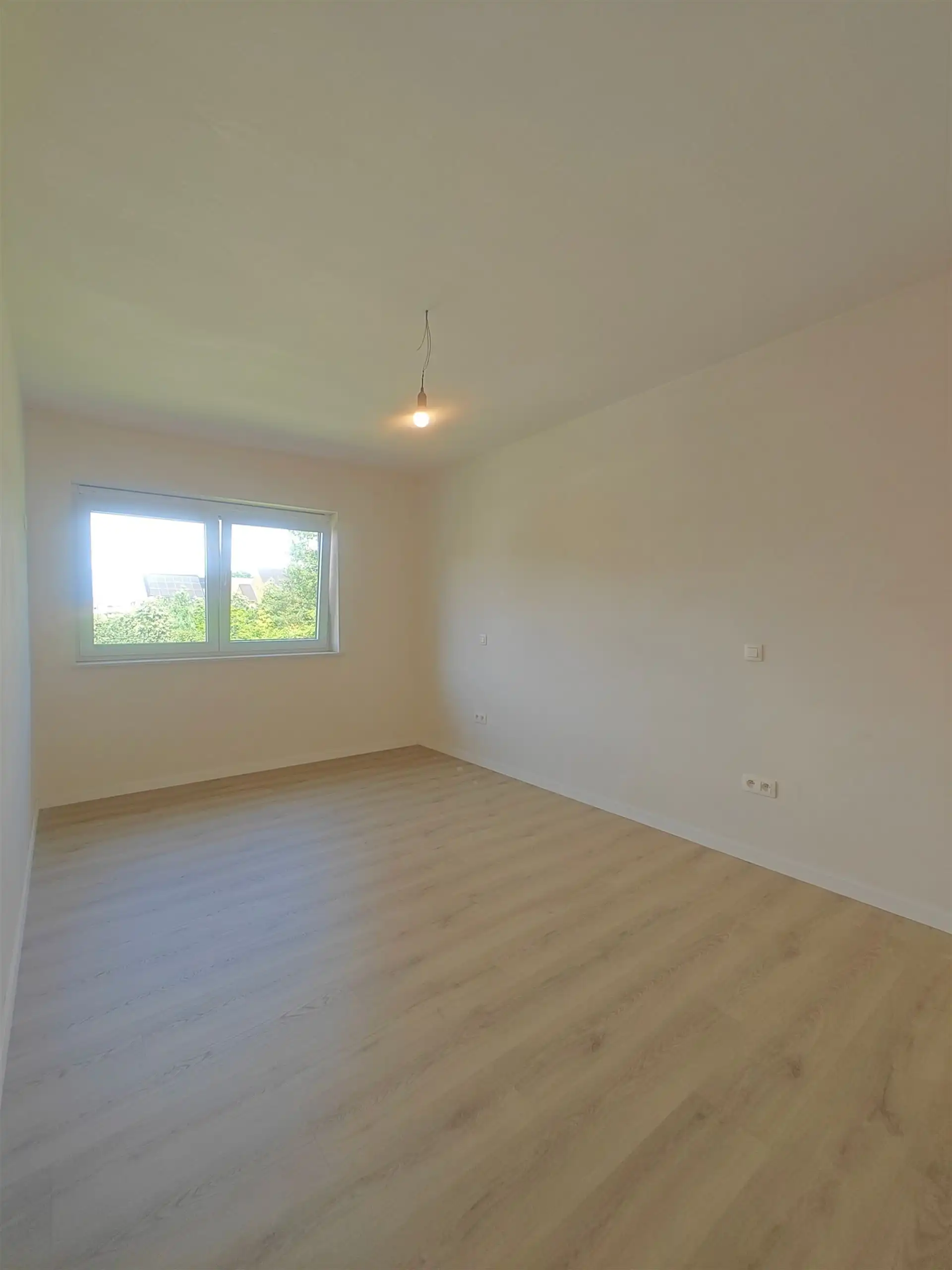 Instapklare nieuwbouwwoning met 3 slaapkamers in een rustige, kindvriendelijke buurt van Maasmechelen.  foto 16