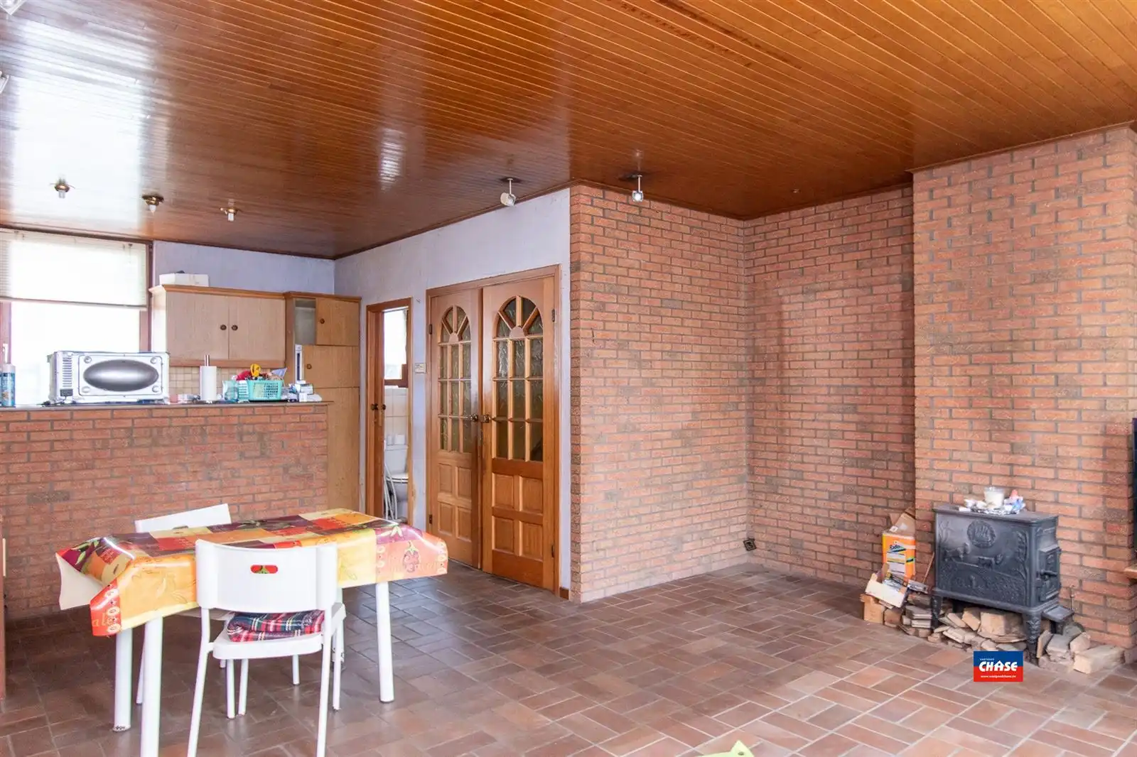 Te renoveren rijwoning met magazijn foto 2