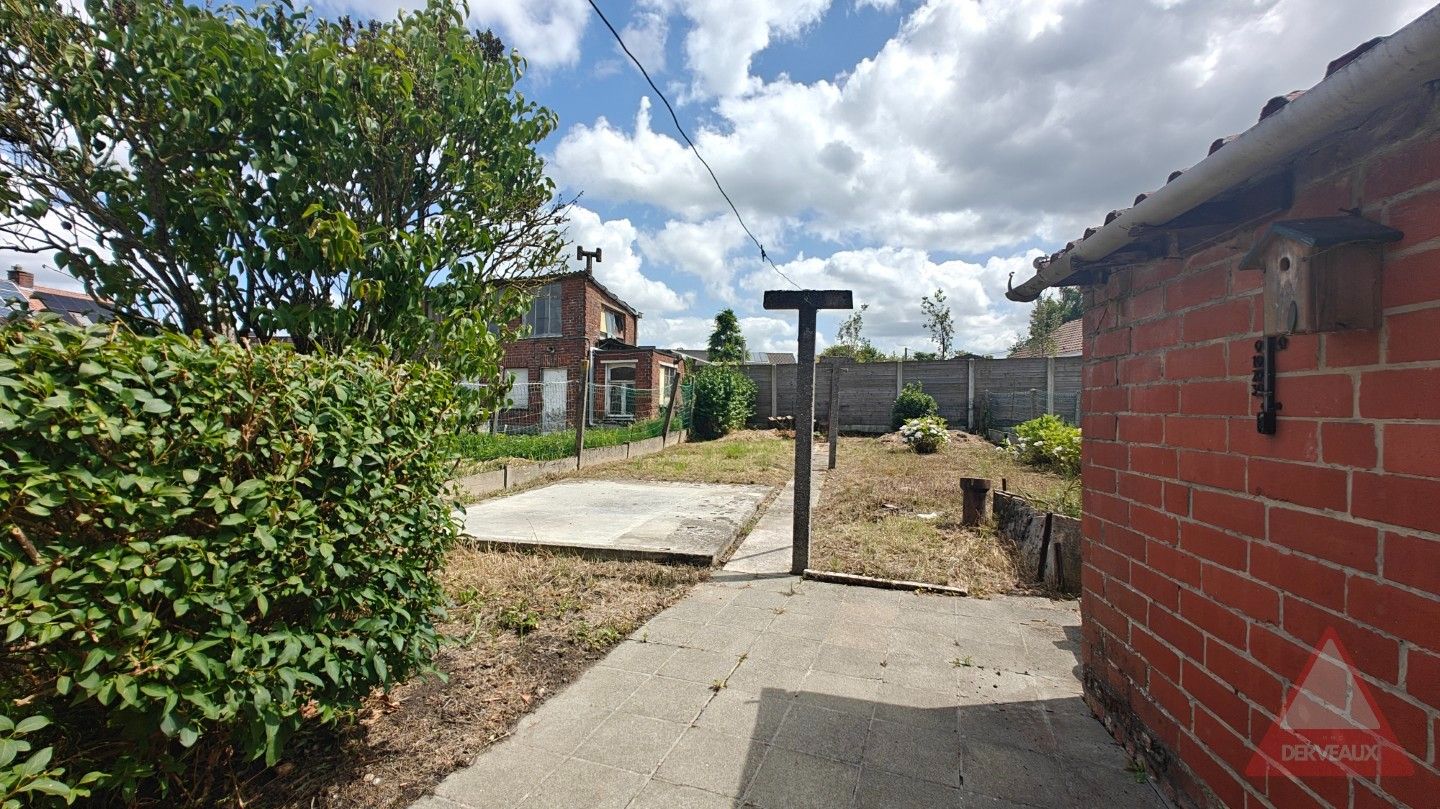Passendale – Te renoveren woning met tuin, garage en vaste trap naar zolder foto 11