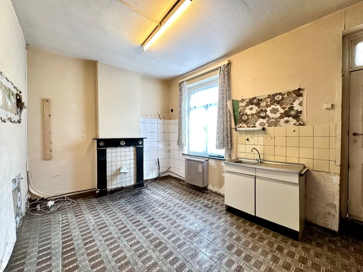 Te renoveren woning met veel mogelijkheden in het hart van Tongeren foto 4