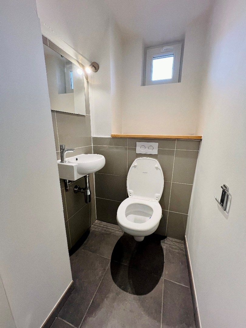 Gerenoveerde rijwoning met 3 slaapkamers en koer met prachtig zicht in centrum Tienen foto 12