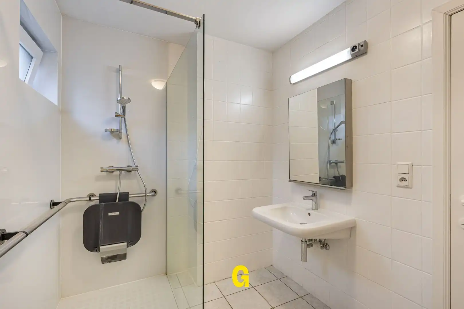 Degelijk (rolstoelvriendelijk) gelijkvoersappartement met terras uitgevend op de tuin, afsluitbare garage en berging foto 16