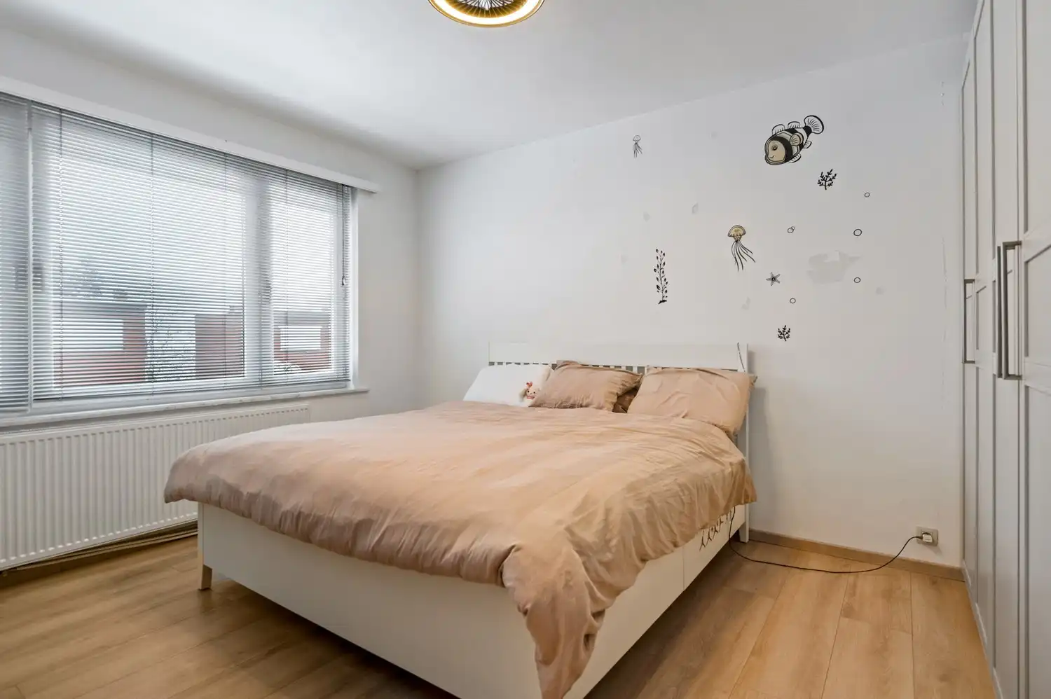 Ruime grotendeels gerenoveerde belétage met 3 slaapkamers, tuin en garage met oprit in Kapellen foto 10