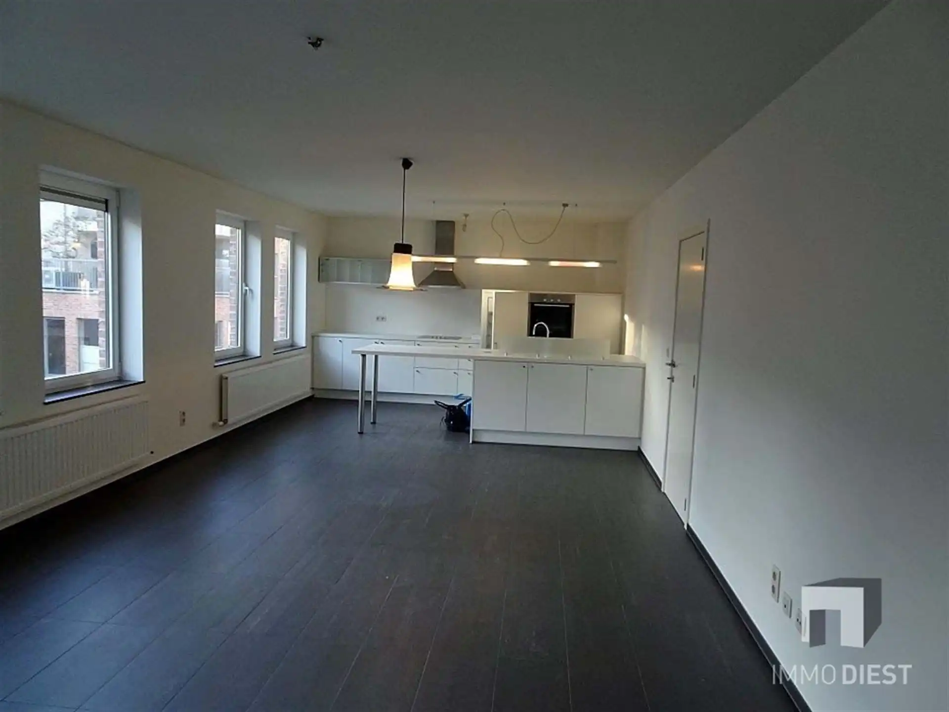 Prachtig ruim appartement met veel lichtinval bestaande uit twee slaapkamers, terras, ondergrondse staanplaats in het centrum van Halen. foto 8