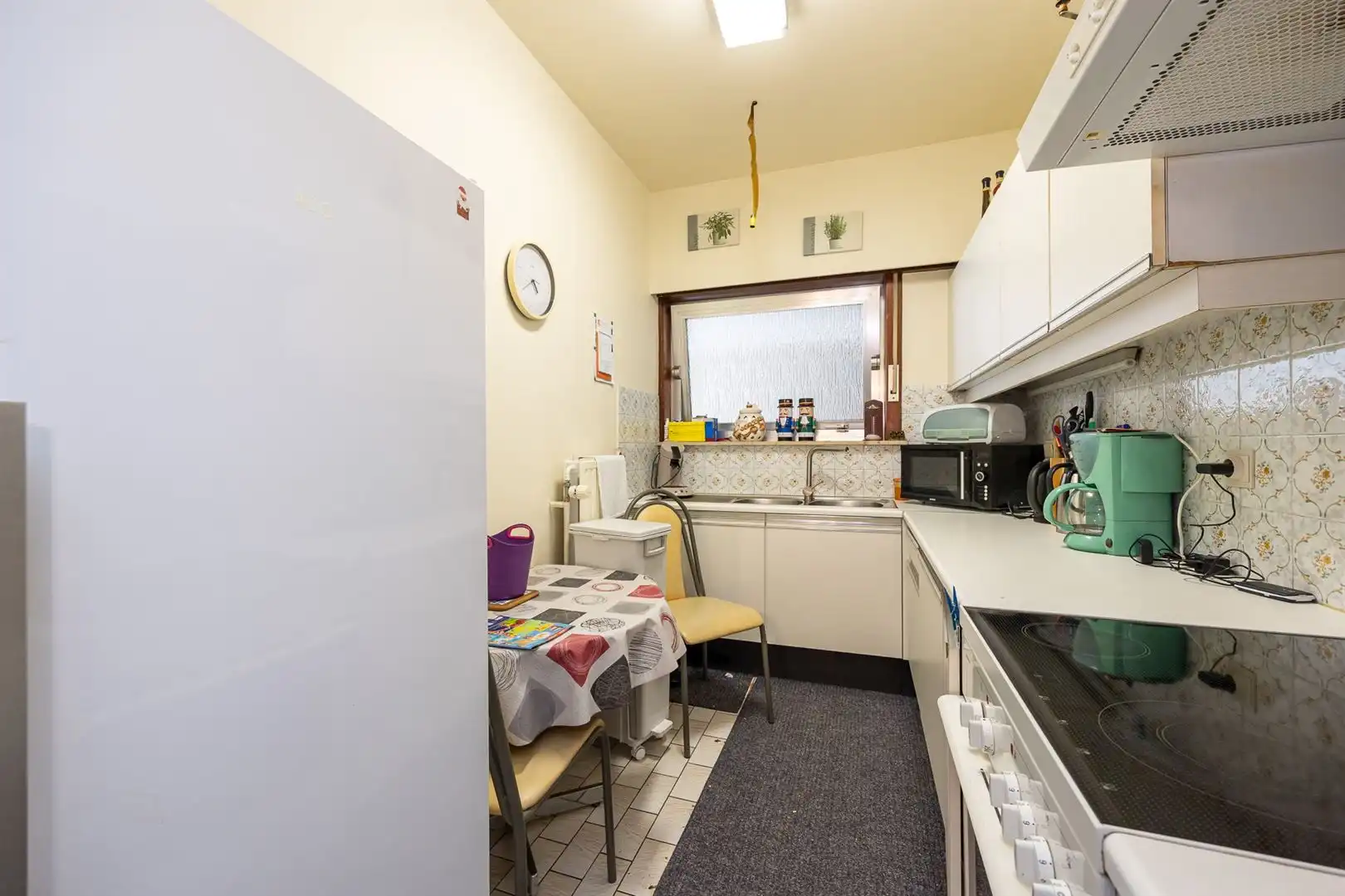 Opbrengsteigendom met 5 appartementen en garages foto 47