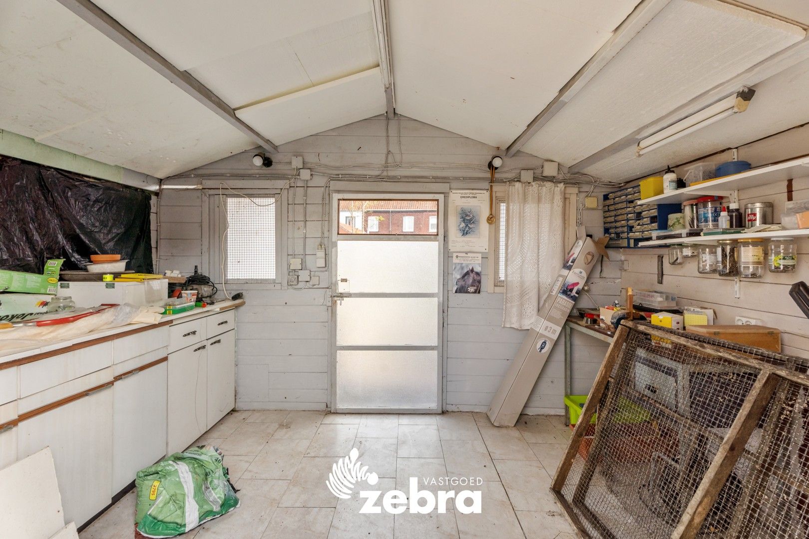Op te frissen woning met zuidwestgerichte tuin en uitweg op een centrale ligging te Tielt! foto 25