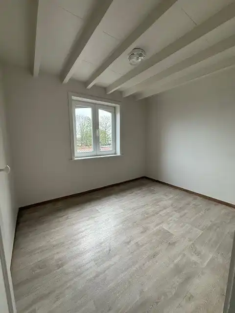 Centraal gelegen, deels te renoveren woning foto 6