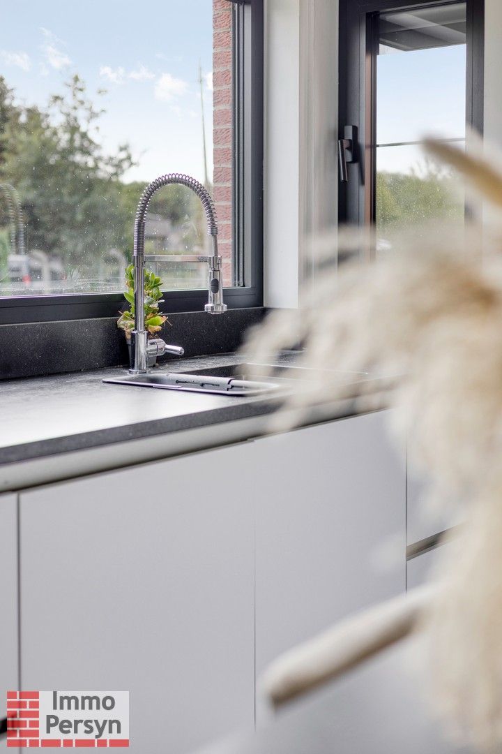 Instapklare en volledig gerenoveerde woning met 3 slpk en garage foto 11