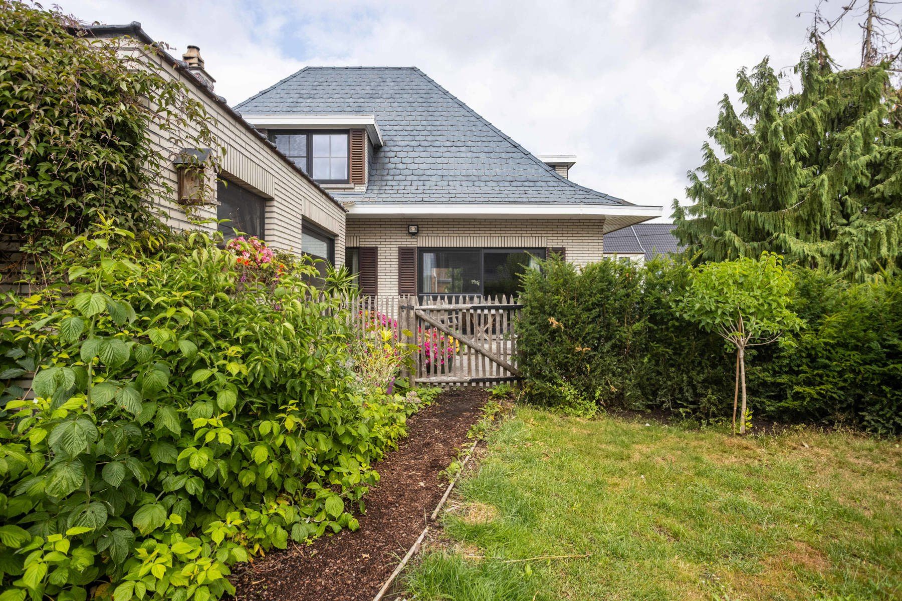 Aangename woning met 4slpk, tuin + garage  foto 21