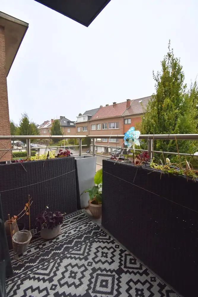 Energiezuinig appartement met 1 slaapkamer, terras, staanplaats en kelder te Sint-Pieters-Leeuw foto 2