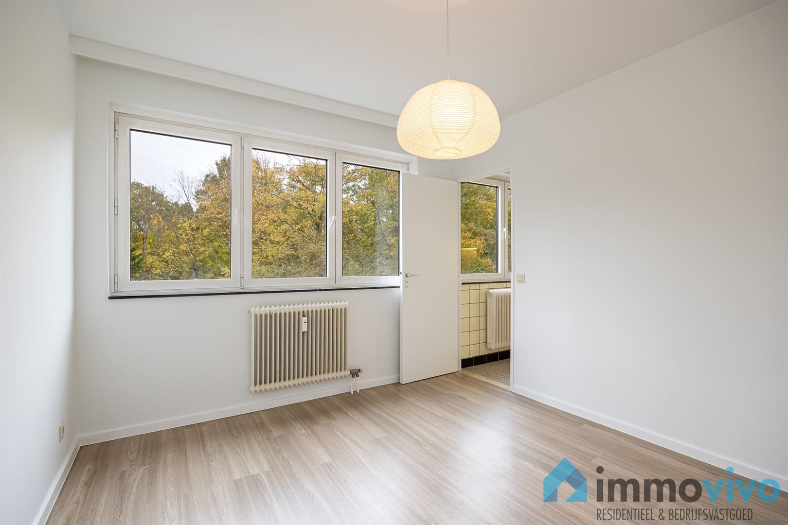 Instapklaar éénslaapkamerappartement met terras en parkzicht foto 9