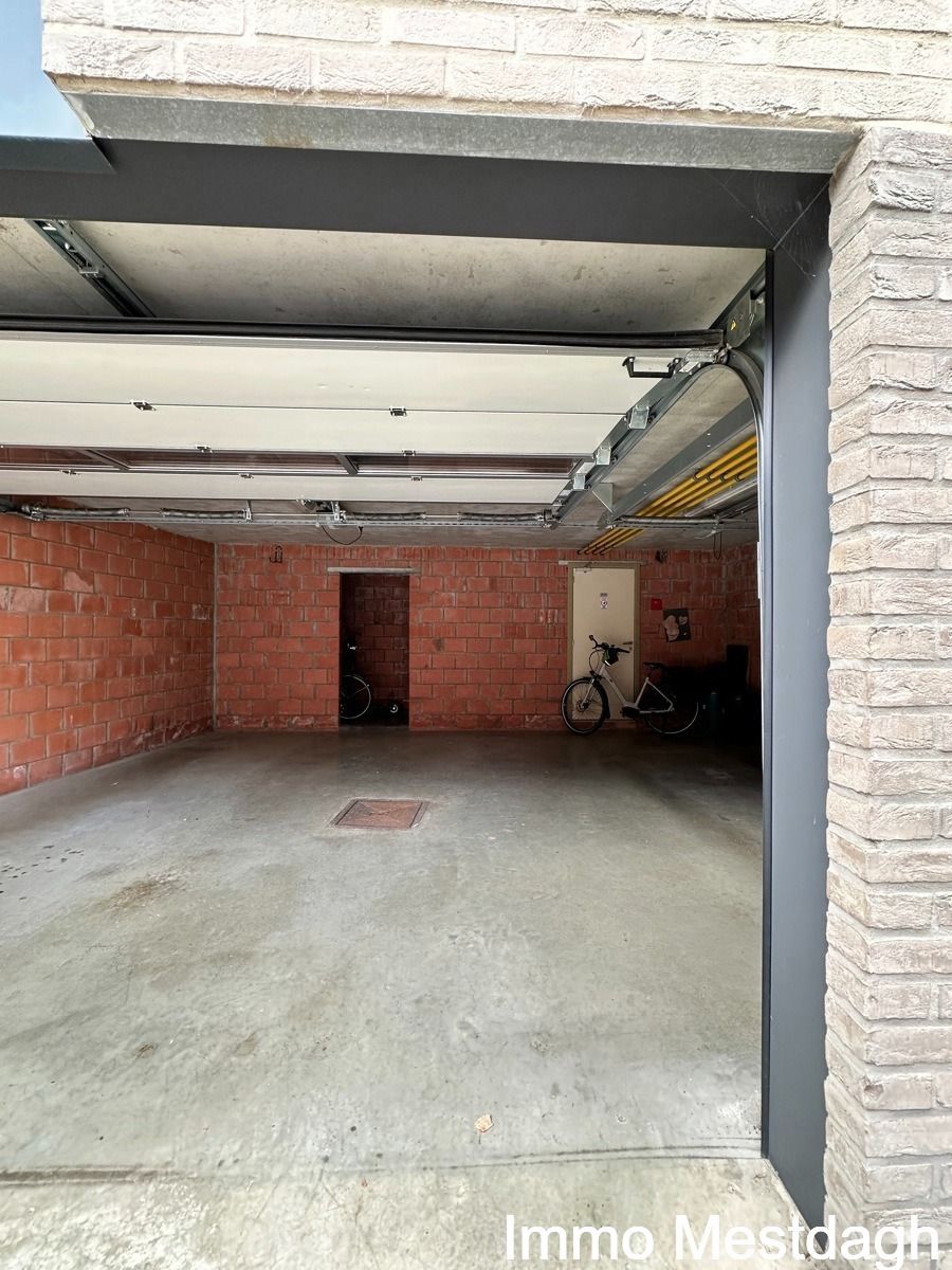 Ruim gelijkvloers appartement met tuin en autostaanplaats. foto 32