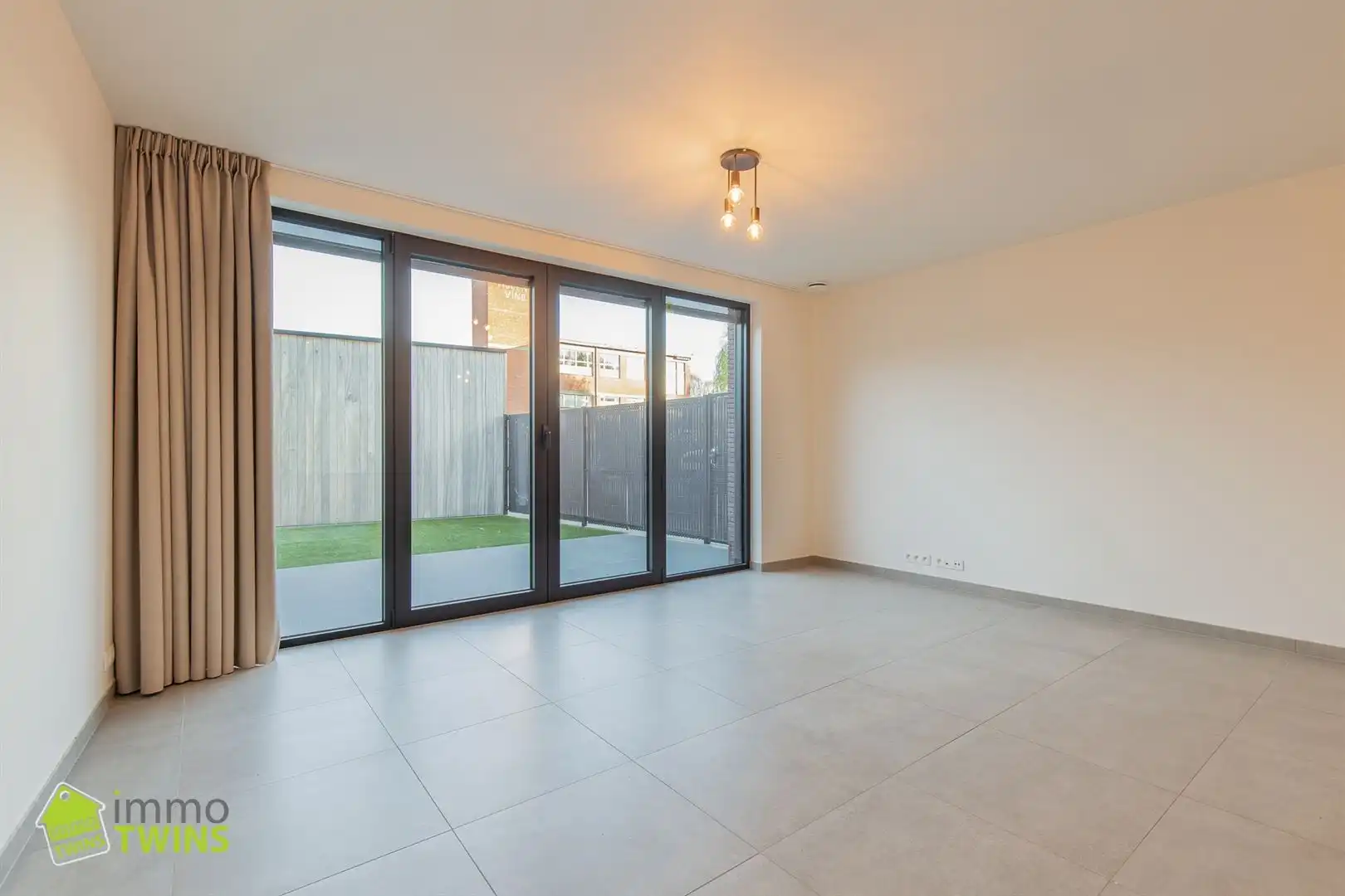 Modern gelijkvloers appartement met tuinterras en staanplaats te Grembergen bij Dendermonde  foto 3