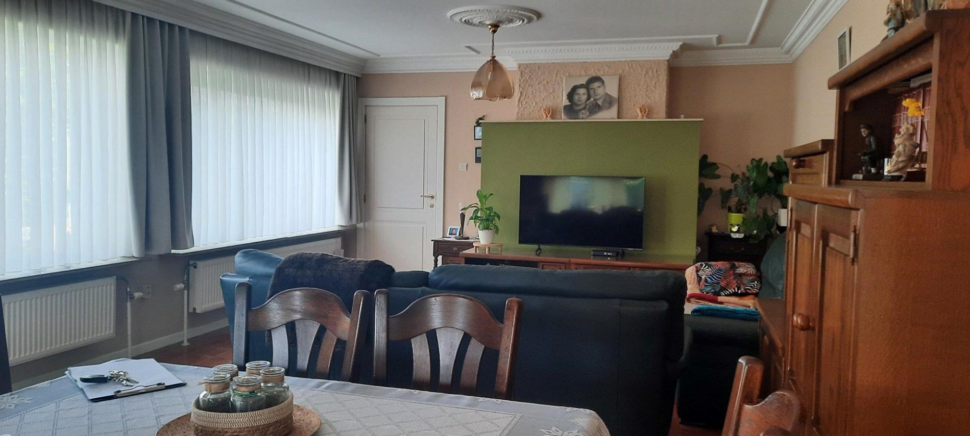 Halfopen woning met 3 slaapkamers, tuin en garage te Neeroeteren.  foto 2